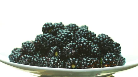 BlackBerry is rotating in the plate. Video stock 94010199