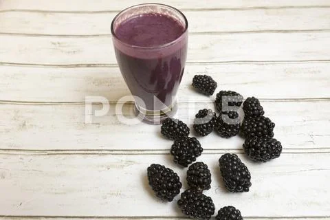 Blackberry smoothie with fresh berries Stock Photos