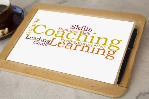 Blackboard with coaching word cloud Stock Photos