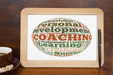 Blackboard with coaching word cloud Stock Photos