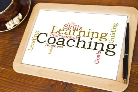 Blackboard with coaching word cloud Stock Photos