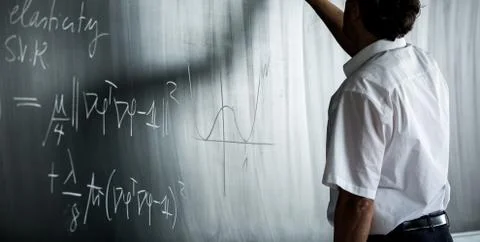 Blackboard with math lesson written on it Stock Photos