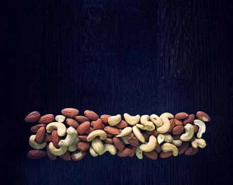 Blackboard with nuts Stock Photos