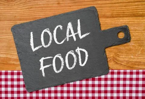 A blackboard with a red checkered tablecloth - Local Food Stock Photos