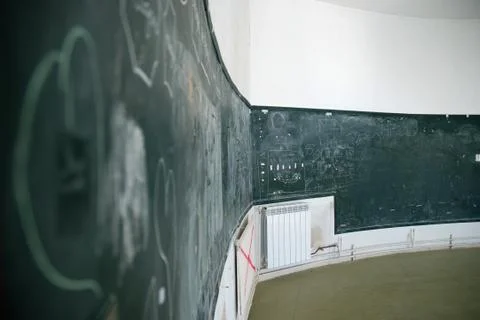Blackboard in a run-down school, concept of education in crisis Photos