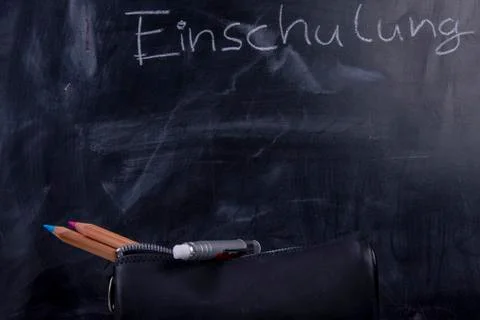 Blackboard with text "induction school" Stock Photos