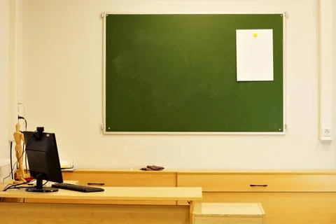 A blackboard on the wall in the classroom for teaching. Stock Photos