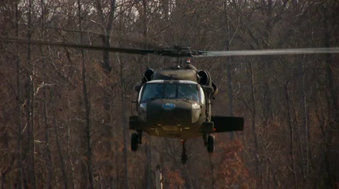 Blackhawk hover and flyover Stock Footage 1101106