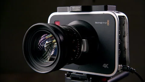 Blackmagic Production Camera 4K with Samyang 50mm on Tripod Video stock 333684627