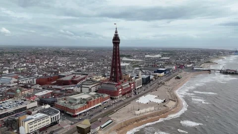 Blackpool Tower and beach high angle drone aerial push in shot Stock Footage 336298086