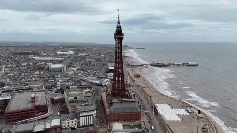 Blackpool Tower and beach Panning drone aerial Stock Footage 336299686