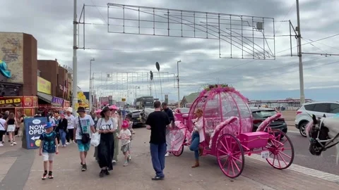 Blackpool UK 02 Aug, 2024: Seafront Golden Mile  Amusements 4k video Stock Footage 280776596