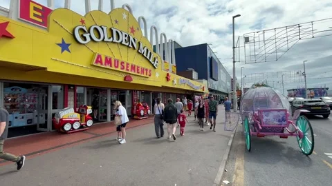 Blackpool UK 02 Aug, 2024: Seafront Golden Mile Amusements. 4k video Stock Footage 280819844