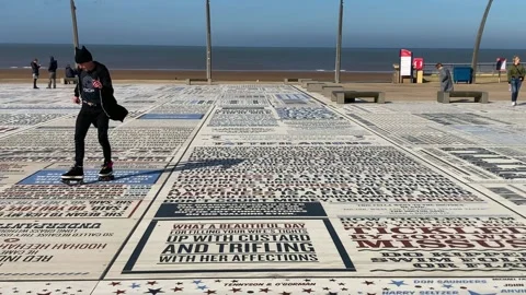 Blackpool, UK 03/31/2024 Tourists explore the Comedy Pavement Stock Footage 270422977