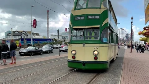 Blackpool, UK 08 June 2024: Rainbow Pride Vintage Trams by the seaside. 4k video Stock Footage 277105249