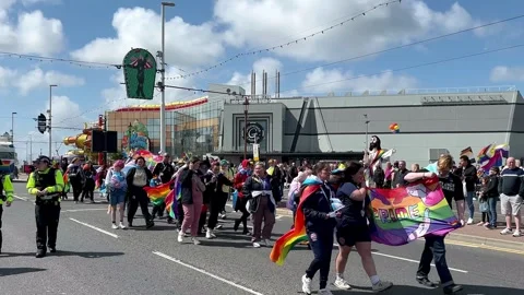 Blackpool, UK 08 June 2024: Summer rainbow Pride festivities by the seaside. Stock Footage 277105341