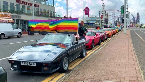 Blackpool, UK 08 June 2024: Summer rainbow Pride festivities_TVR cars Stock Footage 277105378
