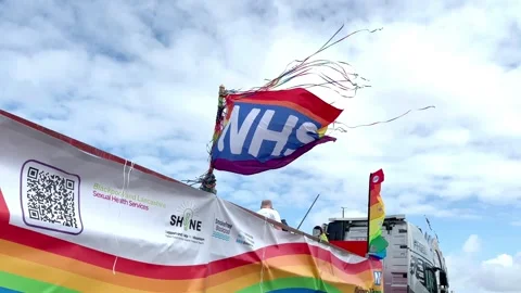 Blackpool, UK 08 June 2024: NHS Flag at summer rainbow Pride festivitial Stock Footage 277105385