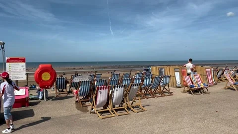 Blackpool, UK 2024 Aug 11; Deckchair rental for Red Arrows_Free seaside airshow Stock Footage 281556746