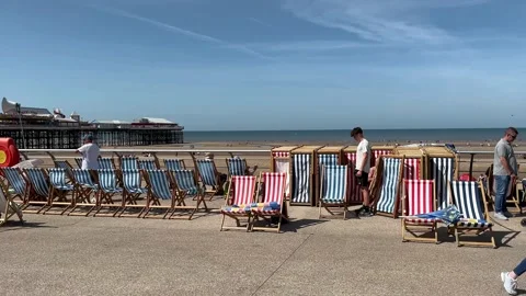 Blackpool, UK 2024 Aug 11; Deckchair rental for Red Arrows_Free seaside airshow Stock Footage 281556756