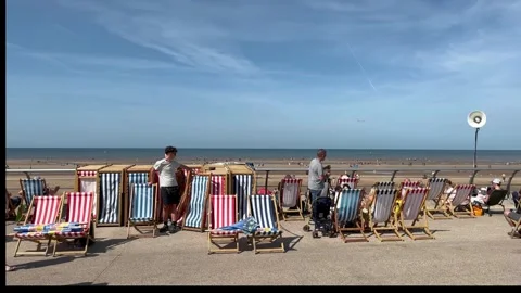 Blackpool, UK 2024 Aug 11; Deckchair rental for Red Arrows_Free seaside airshow Stock Footage 281556761