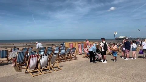 Blackpool, UK 2024 Aug 11; Deckchair rental for Red Arrows_Free seaside airshow Stock Footage 281556764