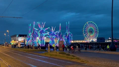 BLACKPOOL, UK 2024 Aug 27; Ride the Lights Central Pier lluminations Stock Footage 282858040
