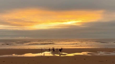 Blackpool, UK 2024 Aug 27: Ebb tide Shimmering Beach sunset Stock Footage 282860964