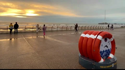 Blackpool, UK 2024 Aug 27: Ebb tide Shimmering Beach sunset Stock Footage 282878233