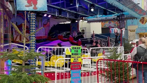 Blackpool, UK 2024 Dec 29; OK to Ride Height Measurement for fair ride Stock Footage 296574847