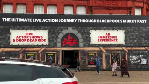 Blackpool, UK 2024 Dec 29: Scan QR code for details of Dungeon Show Stock Footage 296574868