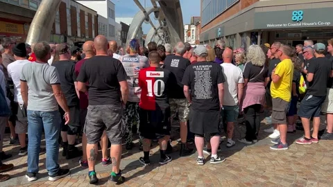 Blackpool, UK. 2025 Aug, 10: Punks assemble in Birley Street. 4k video Stock Footage 314614581