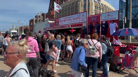 Blackpool, UK. 2025 Aug 10; Airshow crowds on seafront promenade. 4k video Stock Footage 314645460