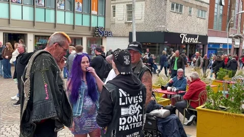Blackpool UK 2025 Aug 10: Rebellion Punks queuing in line. 4K video Stock Footage 314718840
