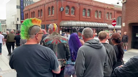 Blackpool UK 2025 Aug 10: Rebellion Punks queuing in line. 4K video Stock Footage 314718987