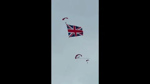 Blackpool, UK. 2025 AUG, 10; Red Devils parachute team in 4K Stock Footage 314734592