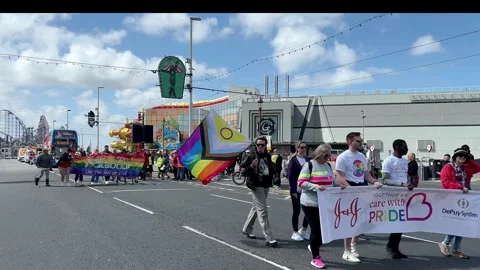 Blackpool, UK 8 June 2024: Summer rainbow Pride festivities by the seaside. Stock Footage 277105351