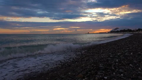 Blacksea Beach At Sundown Waves Rolling In Golden Sunlight. 4K Video stock 90074248