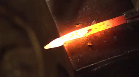 Blacksmith Artist Hammering Steel on Anvil Stock Footage