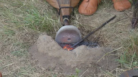 Blacksmith Blowing Fire Stock Footage 302028531