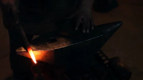 Blacksmith burns, works with wood Stock Footage 101028675