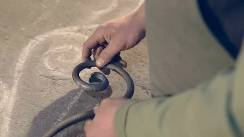 Blacksmith close-up detail compares with pattern Stock Footage 76396417