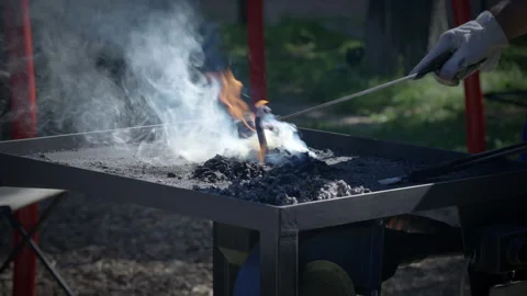 Blacksmith Coal Forge With Smoke And Tongs Stock Footage 336465036