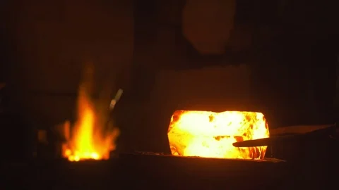 Blacksmith creates a hammer Stock Footage 72694295