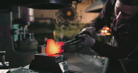The blacksmith creates a steel blank Video stock 165379957