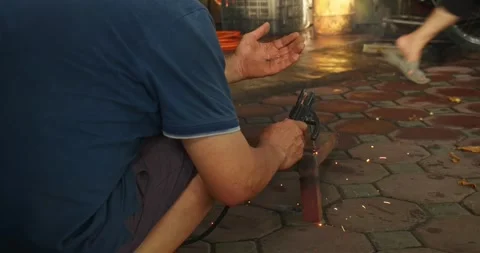 Blacksmith cutting metal using angle grinder while working in industrial Stock Footage 289907377