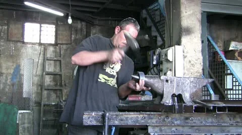 Blacksmith doing his duty Stock Footage 10170224