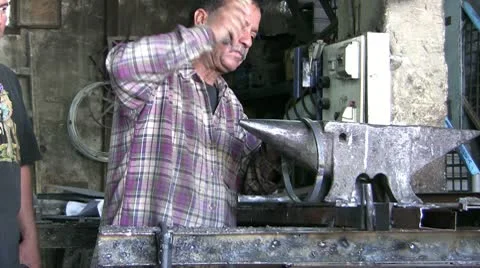 Blacksmith doing his duty Stock Footage 10588959