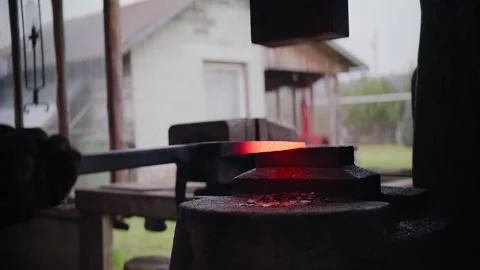Blacksmith doing metal work Stock Footage 147728032