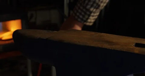 Blacksmith farrier working on horseshoe Video stock 120451651